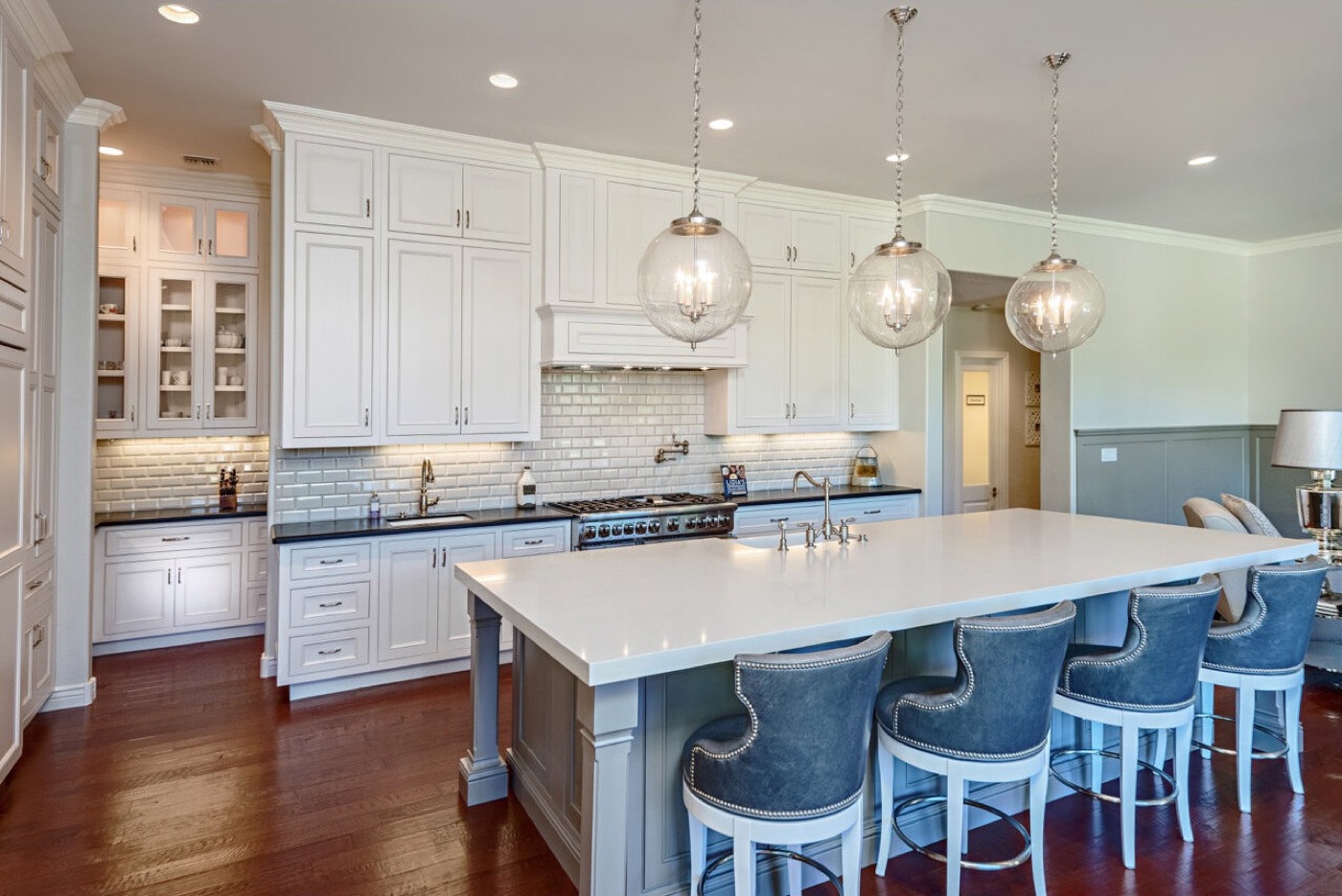 Traditional white kitchen with island in Scottsdale, AZ